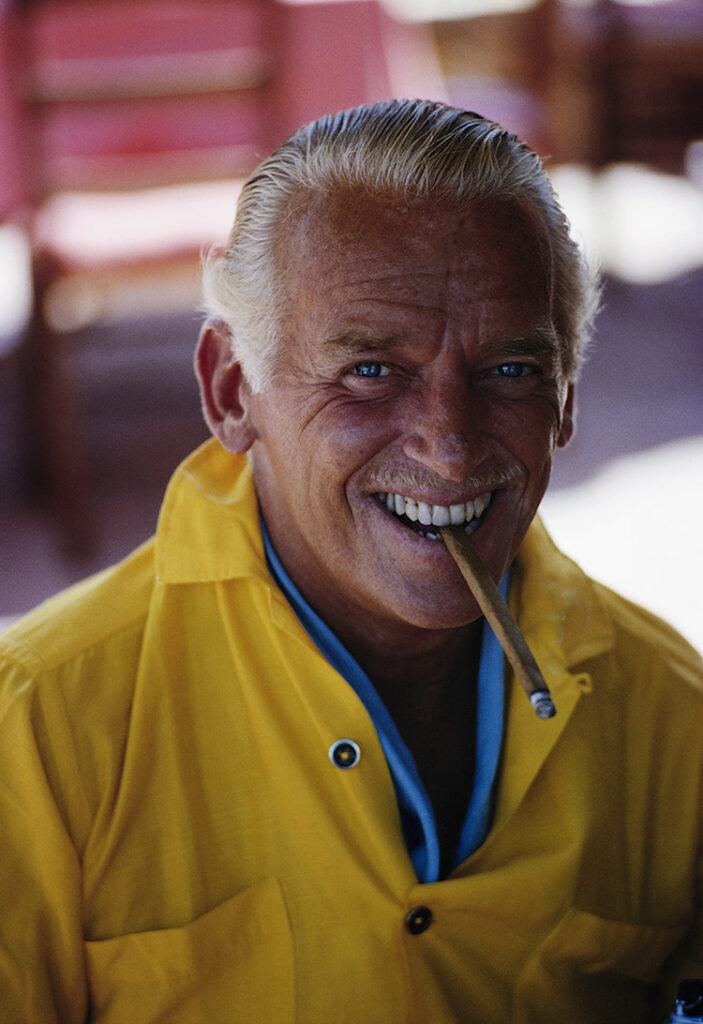 Douglas Fairbanks Jr. at a harbor side restaurant, Porto Ercole, Italy, August 1966.